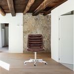 Featuring Malibu Desk Chair - Antique Whiskey by Four Hands at Amethyst Home. Paired back and fashion-forward, this minimalist desk chair in a dark chestnut top-grain leather offers maximum comfort. Inspired by workspaces of the ‘50s and ‘60s. Stainless steel casters make for stylish ease in the workplace. Height not adjustable.
Overall Dimensions: 20.75"W x 2.  Amethyst Home provides interior design, new home construction design consulting, vintage area rugs, and lighting in the Miami metro area.