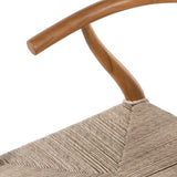Featuring Muestra Dining Chair - Natural Teak by Four Hands at Amethyst Home. Modern curves redefine classic wishbone seating in this Muestra Dining Chair - Natural Teak. Vintage white all-weather wicker is woven for a dose of fresh texture against a neutral frame of natural teak. Cover or store indoors during inclement weather and when not in use.
Overall D.  Amethyst Home provides interior design, new home construction design consulting, vintage area rugs, and lighting in the Seattle metro area.