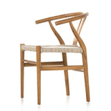 Featuring Muestra Dining Chair - Natural Teak by Four Hands at Amethyst Home. Modern curves redefine classic wishbone seating in this Muestra Dining Chair - Natural Teak. Vintage white all-weather wicker is woven for a dose of fresh texture against a neutral frame of natural teak. Cover or store indoors during inclement weather and when not in use.
Over.  Amethyst Home provides interior design, new home construction design consulting, vintage area rugs, and lighting in the Laguna Beach metro area.