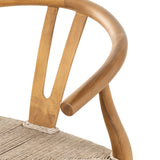 Featuring Muestra Dining Chair - Natural Teak by Four Hands at Amethyst Home. Modern curves redefine classic wishbone seating in this Muestra Dining Chair - Natural Teak. Vintage white all-weather wicker is woven for a dose of fresh texture against a neutral frame of natural teak. Cover or store indoors during inclement weather and when not in use.
Overal.  Amethyst Home provides interior design, new home construction design consulting, vintage area rugs, and lighting in the Washington metro area.