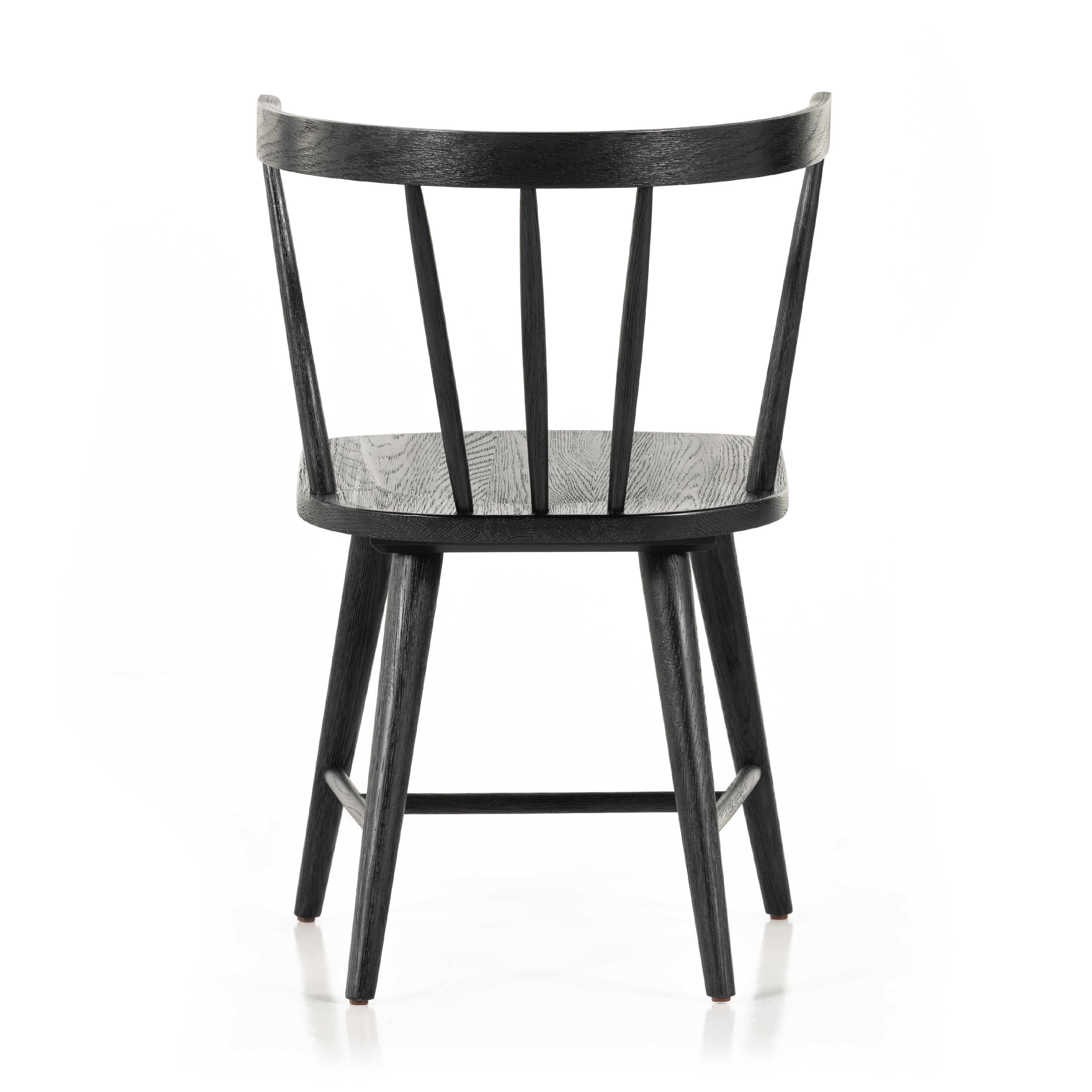Featuring Naples Dining Chair - Black Oak by Four Hands at Amethyst Home. This Naples Dining Chair - Black Oak is a fresh twist on traditional Windsor-style seating is crafted from solid black-finished oak, for a look that’s always in style.
Overall Dimensions: 20.50"W x 21.50"L x 31.75"HColors: Black Oak, Black Oak VeneerMaterials: Solid Oak, Oak VeneerWe.  Amethyst Home provides interior design, new home construction design consulting, vintage area rugs, and lighting in the Nashville metro area.