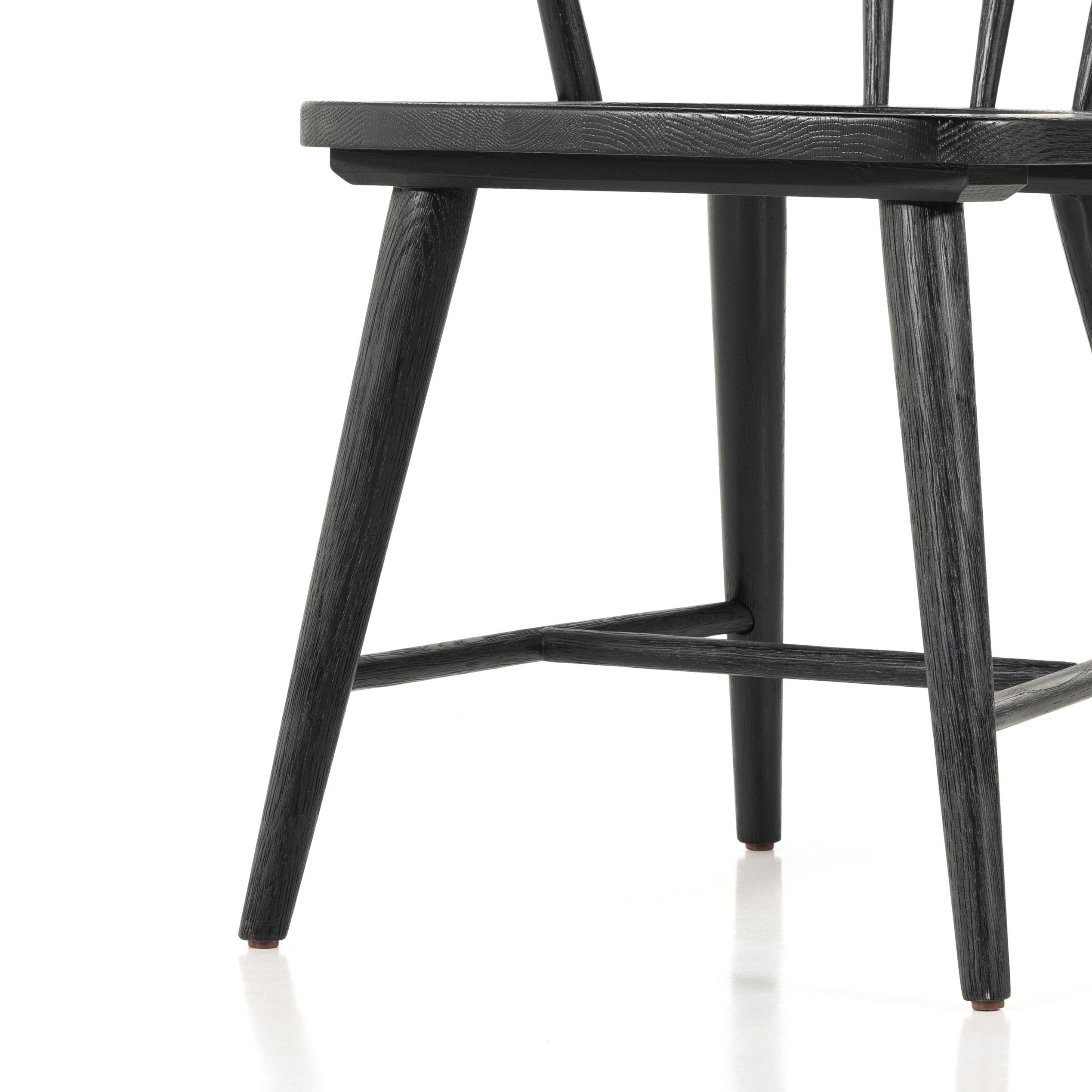 Featuring Naples Dining Chair - Black Oak by Four Hands at Amethyst Home. This Naples Dining Chair - Black Oak is a fresh twist on traditional Windsor-style seating is crafted from solid black-finished oak, for a look that’s always in style.
Overall Dimensions: 20.50"W x 21.50"L x 31.75"HColors: Black Oak, Black Oak VeneerMaterials: Solid Oak, Oak VeneerW.  Amethyst Home provides interior design, new home construction design consulting, vintage area rugs, and lighting in the Alpharetta metro area.