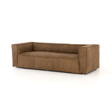 Featuring Nolita Reverse Stitch Sofa - Natural Washed Sand by Four Hands at Amethyst Home. Sophisticated Italian styling with distinctly casual appeal is found in this Nolita Reverse Stitch Sofa - Natural Washed Sand. Top-grain leather takes on a natural sand color with contrast stitching along the welt, sure to elevate the space for any living room. 
Overall .  Amethyst Home provides interior design, new home construction design consulting, vintage area rugs, and lighting in the Omaha metro area.