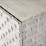 Featuring Rio Media Console - Round Cut White Wash by Four Hands at Amethyst Home. We love the texture of this Rio Media Console - Round Cut White Wash. Made from solid mango with spacious interior shelving and a rear cutout for card management, this is a beautiful piece to add to any living room or entertainment area. 
Overall Dimensions: 82"W x 18.25"L x 2.  Amethyst Home provides interior design, new home construction design consulting, vintage area rugs, and lighting in the Seattle metro area.