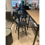 Featuring Ripley Black Oak Bar + Counter Stool by Four Hands at Amethyst Home. A fresh, bar-style take on mid-century Windsor seating is found in this Ripley Black Oak Bar + Counter Stool. Featuring a bowed, sculptural silhouette and soft black finish to highlight the natural grain of weathered oak.
Bar Overall Dimensions: 20.50"W x 20"L x 42.25"HSeat Depth: .  Amethyst Home provides interior design, new home construction design consulting, vintage area rugs, and lighting in the Boston metro area.