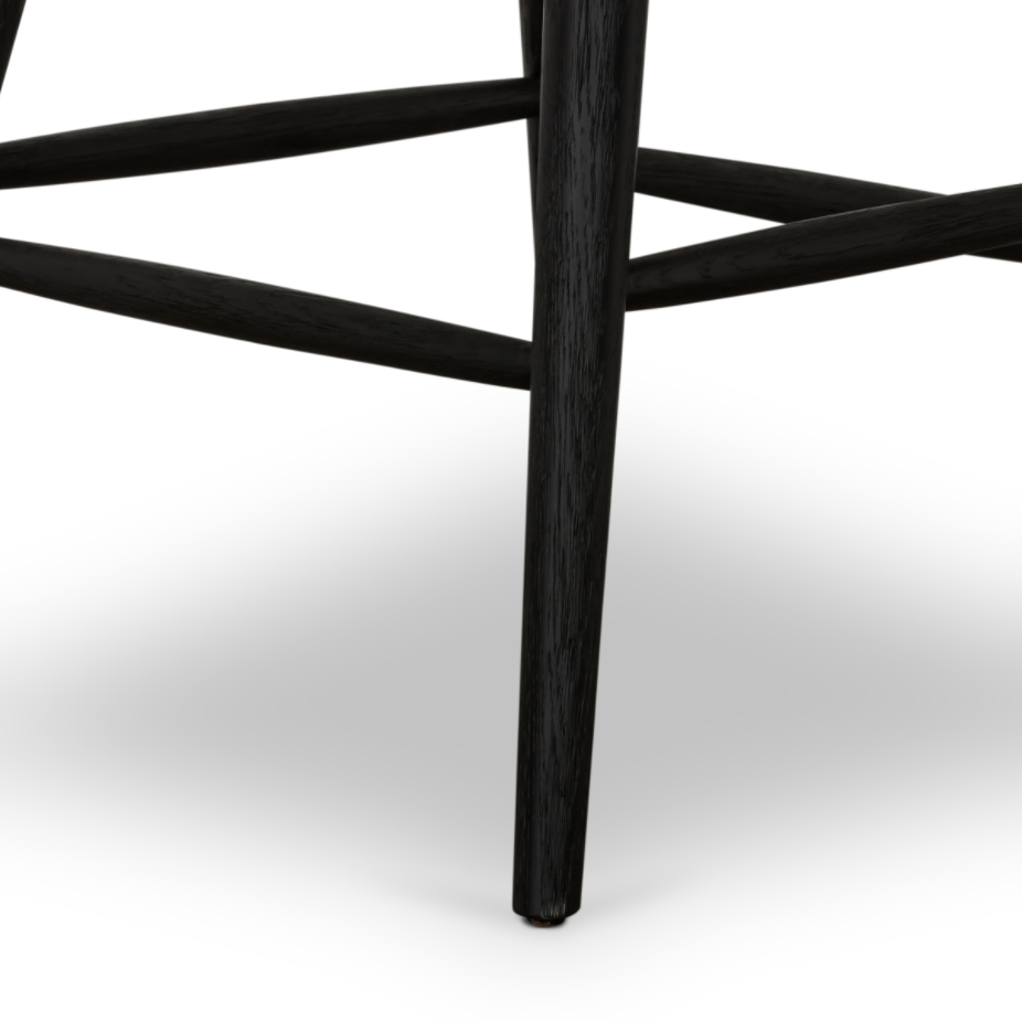 Featuring Ripley Black Oak Bar + Counter Stool by Four Hands at Amethyst Home. A fresh, bar-style take on mid-century Windsor seating is found in this Ripley Black Oak Bar + Counter Stool. Featuring a bowed, sculptural silhouette and soft black finish to highlight the natural grain of weathered oak.
Bar Overall Dimensions: 20.50"W x 20"L x 42.25"HSeat Dept. Amethyst Home provides interior design, new home construction design consulting, vintage area rugs, and lighting in the Des Moines metro area.