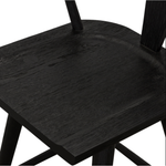 Featuring Ripley Black Oak Bar + Counter Stool by Four Hands at Amethyst Home. A fresh, bar-style take on mid-century Windsor seating is found in this Ripley Black Oak Bar + Counter Stool. Featuring a bowed, sculptural silhouette and soft black finish to highlight the natural grain of weathered oak.
Bar Overall Dimensions: 20.50"W x 20"L x 42.25"HSeat D.  Amethyst Home provides interior design, new home construction design consulting, vintage area rugs, and lighting in the Laguna Beach metro area.