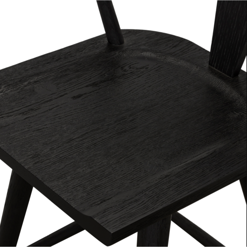 Featuring Ripley Black Oak Bar + Counter Stool by Four Hands at Amethyst Home. A fresh, bar-style take on mid-century Windsor seating is found in this Ripley Black Oak Bar + Counter Stool. Featuring a bowed, sculptural silhouette and soft black finish to highlight the natural grain of weathered oak.
Bar Overall Dimensions: 20.50"W x 20"L x 42.25"HSeat D.  Amethyst Home provides interior design, new home construction design consulting, vintage area rugs, and lighting in the Laguna Beach metro area.