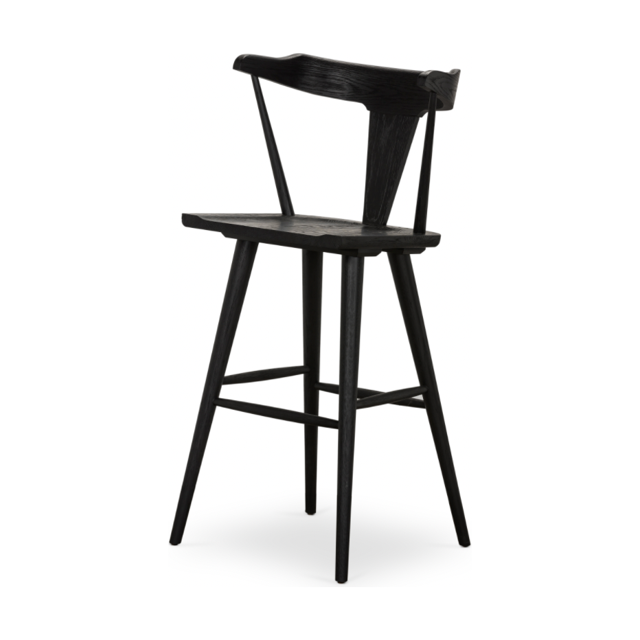 Featuring Ripley Black Oak Bar + Counter Stool by Four Hands at Amethyst Home. A fresh, bar-style take on mid-century Windsor seating is found in this Ripley Black Oak Bar + Counter Stool. Featuring a bowed, sculptural silhouette and soft black finish to highlight the natural grain of weathered oak.
Bar Overall Dimensions: 20.50"W x 20"L x 42.25"HSeat.  Amethyst Home provides interior design, new home construction design consulting, vintage area rugs, and lighting in the Salt Lake City metro area.
