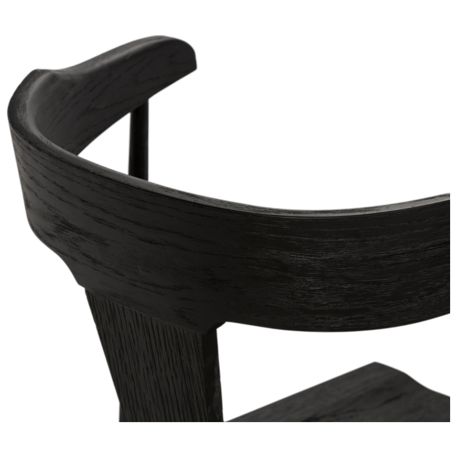 Featuring Ripley Black Oak Bar + Counter Stool by Four Hands at Amethyst Home. A fresh, bar-style take on mid-century Windsor seating is found in this Ripley Black Oak Bar + Counter Stool. Featuring a bowed, sculptural silhouette and soft black finish to highlight the natural grain of weathered oak.
Bar Overall Dimensions: 20.50"W x 20"L x 42.25"HSeat Depth: .  Amethyst Home provides interior design, new home construction design consulting, vintage area rugs, and lighting in the Boston metro area.