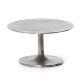 Featuring Simone Coffee Table - Antique Nickel by Four Hands at Amethyst Home. We love the oval shape of this Simone Coffee Table - Antique Nickel. The textural cast aluminum makes for a beautifully modern coffee table, with alluring highs and lows played up by a raw nickel finish.  Great indoors or out; cover or store indoors during inclement weather a.  Amethyst Home provides interior design, new home construction design consulting, vintage area rugs, and lighting in the Laguna Beach metro area.