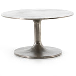 Featuring Simone Coffee Table - Antique Nickel by Four Hands at Amethyst Home. We love the oval shape of this Simone Coffee Table - Antique Nickel. The textural cast aluminum makes for a beautifully modern coffee table, with alluring highs and lows played up by a raw nickel finish.  Great indoors or out; cover or store indoors during inclement weather and when.  Amethyst Home provides interior design, new home construction design consulting, vintage area rugs, and lighting in the Tampa metro area.