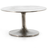 Featuring Simone Coffee Table - Antique Nickel by Four Hands at Amethyst Home. We love the oval shape of this Simone Coffee Table - Antique Nickel. The textural cast aluminum makes for a beautifully modern coffee table, with alluring highs and lows played up by a raw nickel finish.  Great indoors or out; cover or store indoors during inclement weather and when.  Amethyst Home provides interior design, new home construction design consulting, vintage area rugs, and lighting in the Tampa metro area.