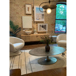 Featuring Simone Coffee Table - Antique Nickel by Four Hands at Amethyst Home. We love the oval shape of this Simone Coffee Table - Antique Nickel. The textural cast aluminum makes for a beautifully modern coffee table, with alluring highs and lows played up by a raw nickel finish.  Great indoors or out; cover or store indoors during inclement weather and w.  Amethyst Home provides interior design, new home construction design consulting, vintage area rugs, and lighting in the Monterey metro area.