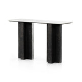 Featuring Terrell Console Table - Raw Black by Four Hands at Amethyst Home. Finished in a raw black, uniquely angular cast aluminum legs, this Terrell Console Table - Raw Black showcases a rectangular tabletop of solid marble in a clean, polished white. We'd love to see this in an entryway or behind a sofa. 
Overall Dimensions: 51"W x 17"L x 31.25"H
Colors: .  Amethyst Home provides interior design, new home construction design consulting, vintage area rugs, and lighting in the Seattle metro area.