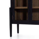 Featuring Tolle Cabinet - Drifted Matte Black by Four Hands at Amethyst Home. The original and signature two tone solid oak cabinet! Carefully crafted on stiletto legs, our clients enjoy its stunning wood grain look.
Overall Dimensions: 38"W x 19"L x 84"HColors: Antique Brass, Drifted Black, Drifted Oak SolidMaterials: Iron, Solid OakWeight: 185.3 lbVolume.  Amethyst Home provides interior design, new home construction design consulting, vintage area rugs, and lighting in the Charlotte metro area.