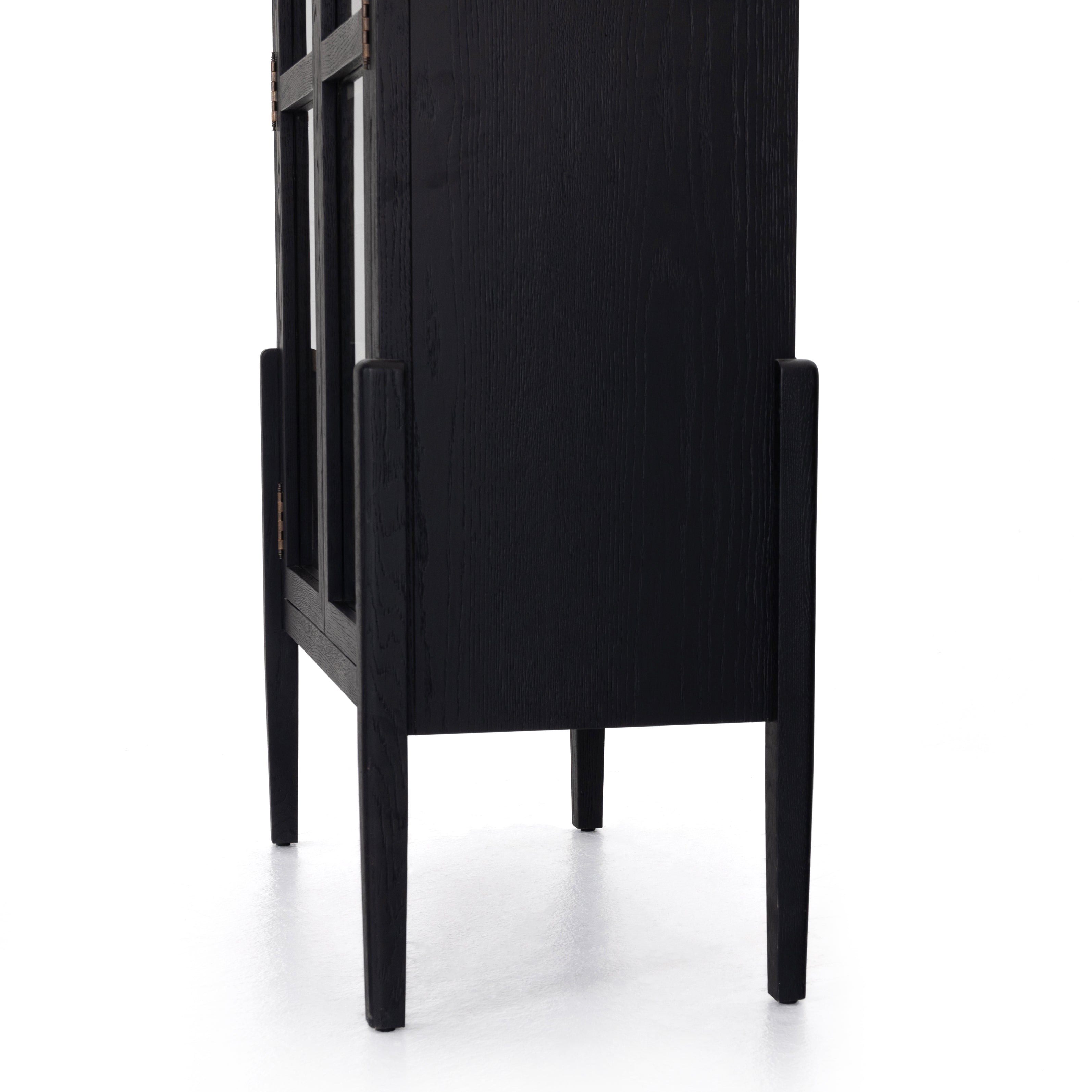 Featuring Tolle Cabinet - Drifted Matte Black by Four Hands at Amethyst Home. The original and signature two tone solid oak cabinet! Carefully crafted on stiletto legs, our clients enjoy its stunning wood grain look.
Overall Dimensions: 38"W x 19"L x 84"HColors: Antique Brass, Drifted Black, Drifted Oak SolidMaterials: Iron, Solid OakWeight: 185.3 lbVolume:.  Amethyst Home provides interior design, new home construction design consulting, vintage area rugs, and lighting in the Monterey metro area.