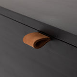 Featuring Trey 5 Drawer Dresser - Black Wash Poplar by Four Hands at Amethyst Home. The toffee leather handles of this Trey 5 Drawer Dresser - Black Wash Poplar bring a classy pop of color and texture to the space. A stylish dresser of black-washed poplar offers plenty of bedroom storage space thanks to five spacious drawers. 
Overall Dimensions: 36"W x 18.  Amethyst Home provides interior design, new home construction design consulting, vintage area rugs, and lighting in the Nashville metro area.