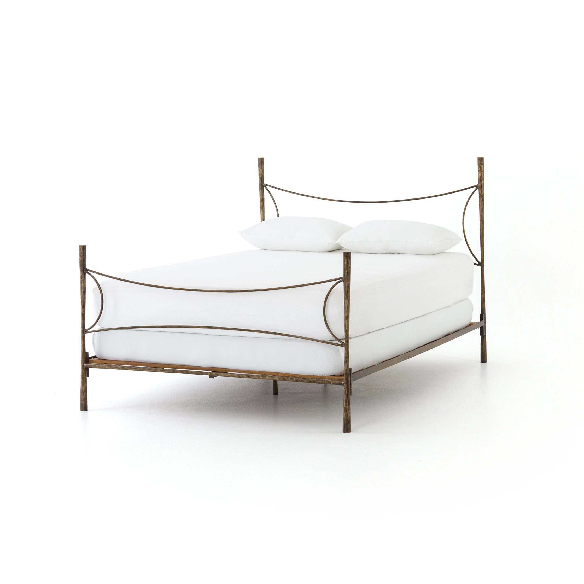 Featuring Westwood Bed by Four Hands at Amethyst Home. Beguiling curves soften hard materials for marked drama with this Westwood Bed. Slim, hammered iron is finished in antique brass for depth that defies this frame's feminine air. Low-profile box spring recommended.
Colors: Antique BrassMaterials: Iron
Queen Overall Dimensions:  62.00"w x 84.00"d x 51.00.  Amethyst Home provides interior design, new home construction design consulting, vintage area rugs, and lighting in the Park City metro area.