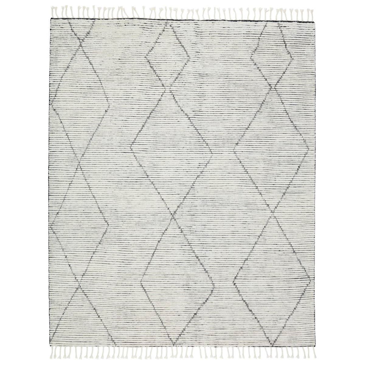 Featuring Alpine Ammil Hand-Knotted Rug by Jaipur Living at Amethyst Home. Inspired by textiles from the Tullu region in Morocco, the Alpine Ammil rug brings texture and versatility to both global and modern spaces. Crafted of natural wool, the hand-knotted Alpine Ammil rug features a plush, ridged feel and an asymmetrical trellis design in cream and black t.  Amethyst Home provides interior design, new home construction design consulting, vintage area rugs, and lighting in the Seattle metro area.