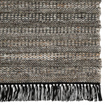 Featuring Castillo Torre Rug - Jet Black by Jaipur Living at Amethyst Home. The handwoven Castillo Torre Area Rug - Jet Black features a soft feel and relaxed, versatile style. The Torre area rug showcases a rich blend of black, gray, and rust tan tones for a grounding, neutral look. Crafted of PET yarn, or recycled plastic, this durable and textured rug bring.  Amethyst Home provides interior design, new home construction design consulting, vintage area rugs, and lighting in the Miami metro area.