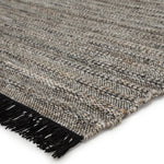 Featuring Castillo Torre Rug - Jet Black by Jaipur Living at Amethyst Home. The handwoven Castillo Torre Area Rug - Jet Black features a soft feel and relaxed, versatile style. The Torre area rug showcases a rich blend of black, gray, and rust tan tones for a grounding, neutral look. Crafted of PET yarn, or recycled plastic, this durable and textured rug br.  Amethyst Home provides interior design, new home construction design consulting, vintage area rugs, and lighting in the Monterey metro area.