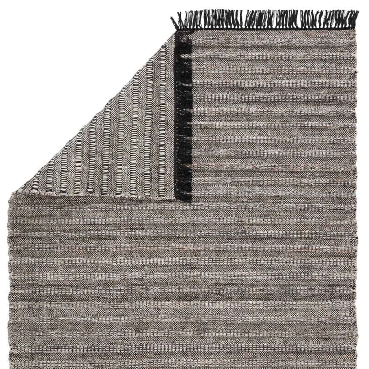 Featuring Castillo Torre Rug - Jet Black by Jaipur Living at Amethyst Home. The handwoven Castillo Torre Area Rug - Jet Black features a soft feel and relaxed, versatile style. The Torre area rug showcases a rich blend of black, gray, and rust tan tones for a grounding, neutral look. Crafted of PET yarn, or recycled plastic, this durable and textured rug .  Amethyst Home provides interior design, new home construction design consulting, vintage area rugs, and lighting in the Washington metro area.