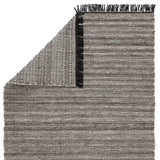 Featuring Castillo Torre Rug - Jet Black by Jaipur Living at Amethyst Home. The handwoven Castillo Torre Area Rug - Jet Black features a soft feel and relaxed, versatile style. The Torre area rug showcases a rich blend of black, gray, and rust tan tones for a grounding, neutral look. Crafted of PET yarn, or recycled plastic, this durable and textured rug .  Amethyst Home provides interior design, new home construction design consulting, vintage area rugs, and lighting in the Washington metro area.