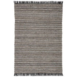 Featuring Castillo Torre Rug - Jet Black by Jaipur Living at Amethyst Home. The handwoven Castillo Torre Area Rug - Jet Black features a soft feel and relaxed, versatile style. The Torre area rug showcases a rich blend of black, gray, and rust tan tones for a grounding, neutral look. Crafted of PET yarn, or recycled plastic, this durable and textured rug.  Amethyst Home provides interior design, new home construction design consulting, vintage area rugs, and lighting in the Los Angeles metro area.