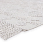 Featuring Cosette Esma Rug by Jaipur Living at Amethyst Home. The handwoven Cosette Esma Area Rug features a textural feel and casual, fun style. The Esma rug showcases a boucle-style geometric design in a light and airy white colorway. Crafted of PET yarn, or recycled plastic, this chic and durable rug brings warmth and a hint of global appeal to indoor and .  Amethyst Home provides interior design, new home construction design consulting, vintage area rugs, and lighting in the Boston metro area.