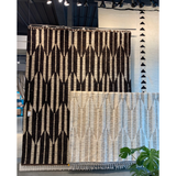 Featuring Keoka Quest Mole Hand-Knotted Rug by Jaipur Living at Amethyst Home. The Keoka Quest Mole Area Rug boasts a fresh take on classic Afghani hand-knotted textiles. In rich, grounding tones of deep brown and ivory, the stylish contrast of the Quest rug anchors room with bold yet neutral appeal. The texture-rich wool pile features a ribbed construct.  Amethyst Home provides interior design, new home construction design consulting, vintage area rugs, and lighting in the Kansas City metro area.