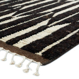 Featuring Keoka Quest Mole Hand-Knotted Rug by Jaipur Living at Amethyst Home. The Keoka Quest Mole Area Rug boasts a fresh take on classic Afghani hand-knotted textiles. In rich, grounding tones of deep brown and ivory, the stylish contrast of the Quest rug anchors room with bold yet neutral appeal. The texture-rich wool pile features a ribbed constru.  Amethyst Home provides interior design, new home construction design consulting, vintage area rugs, and lighting in the Winter Garden metro area.