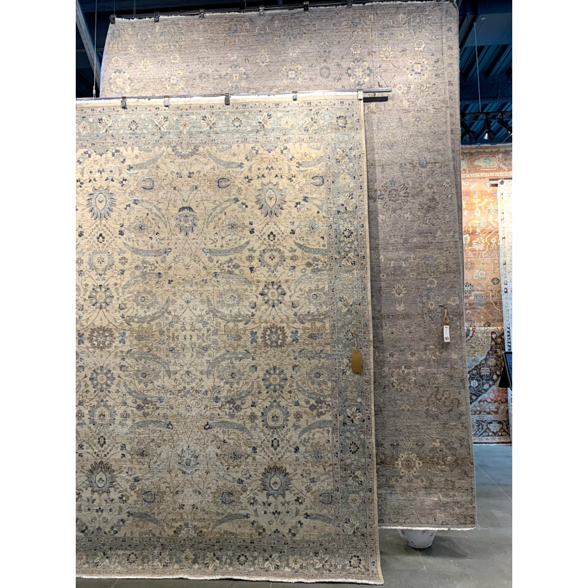 Featuring Tierzah Pembe Hand-Knotted Rug by Jaipur Living at Amethyst Home. The vintage-inspired Tierzah Pembe Area Rug features an antiqued wash and intricate traditional designs. The Pembe wool rug boasts a Persian knot construction and tonal gray, beige, and brown palette that grounds any space. This artisan-made rug features fringe trimmed details for.  Amethyst Home provides interior design, new home construction design consulting, vintage area rugs, and lighting in the Alpharetta metro area.