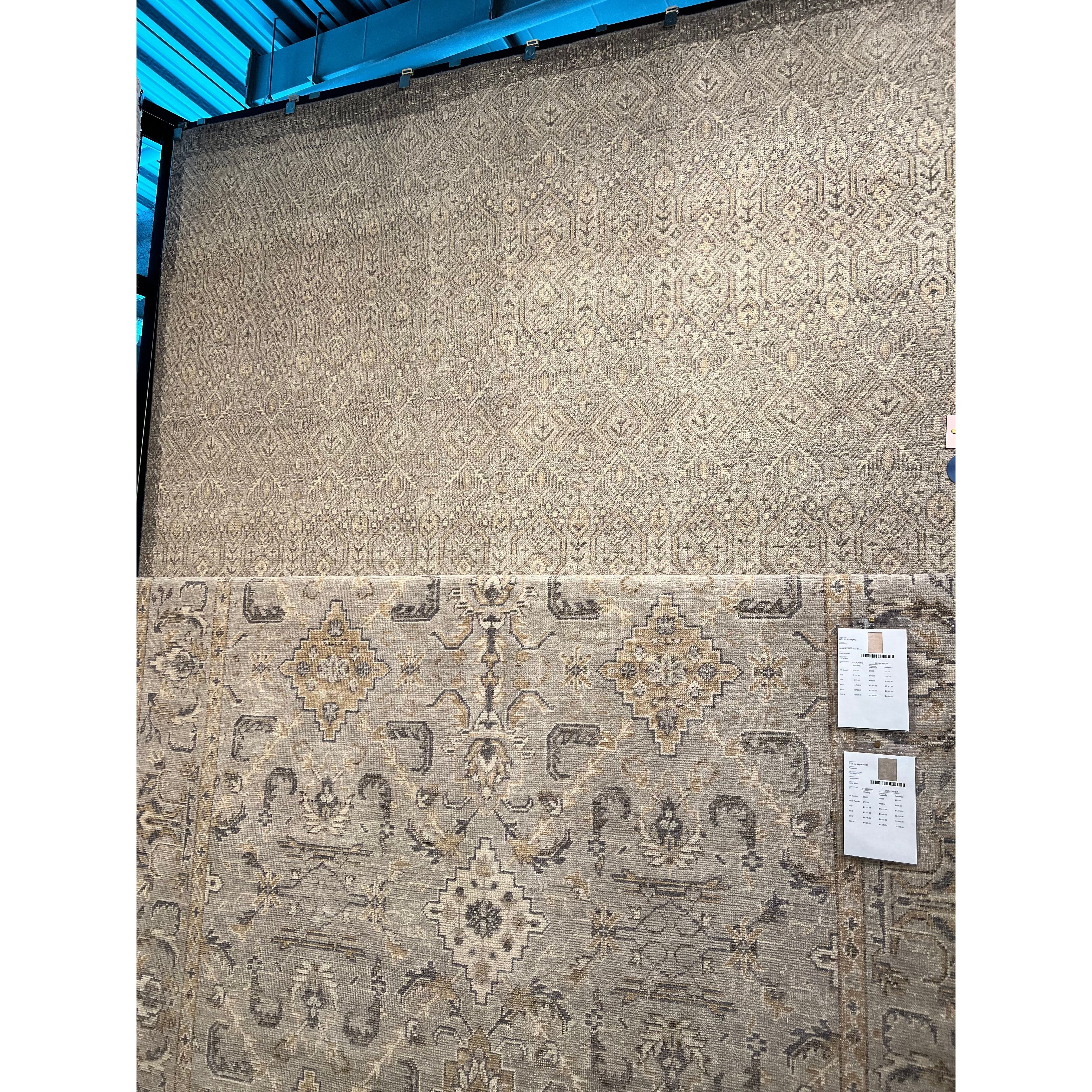 Featuring Revolution Prospect Hand-Knotted Rug by Jaipur Living at Amethyst Home. The Revolution collection is inspired by traditional style and beautifully detailed antique textile designs. The hand-knotted Prospect area rug showcases a captivating geometric design in muted tones of gray and gold. A charcoal edge creates a unique border effect around thi.  Amethyst Home provides interior design, new home construction design consulting, vintage area rugs, and lighting in the Alpharetta metro area.