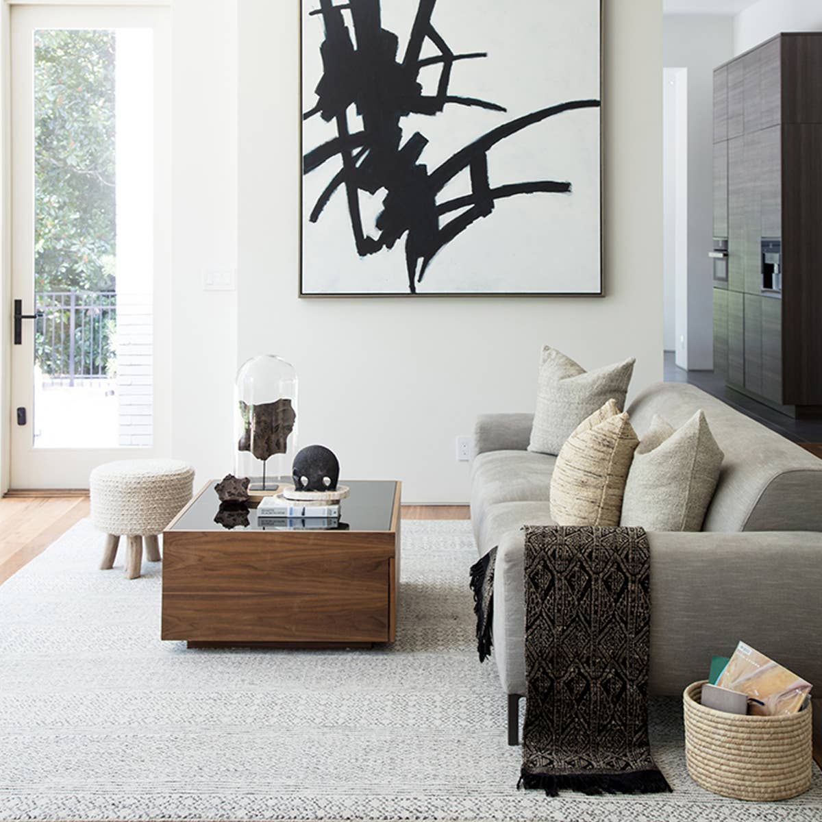 Featuring Rize Neema Hand-Knotted Rug by Jaipur Living at Amethyst Home. The Rize Neema Area Rugs offers intricate and delicately designed global patterns to the modern home. Small-scale geometric motifs create a captivating banded design on the artistically distressed Neema area rug. In a light neutral colorway of white and gray, this durable hand-knotted wo.  Amethyst Home provides interior design, new home construction design consulting, vintage area rugs, and lighting in the Dallas metro area.