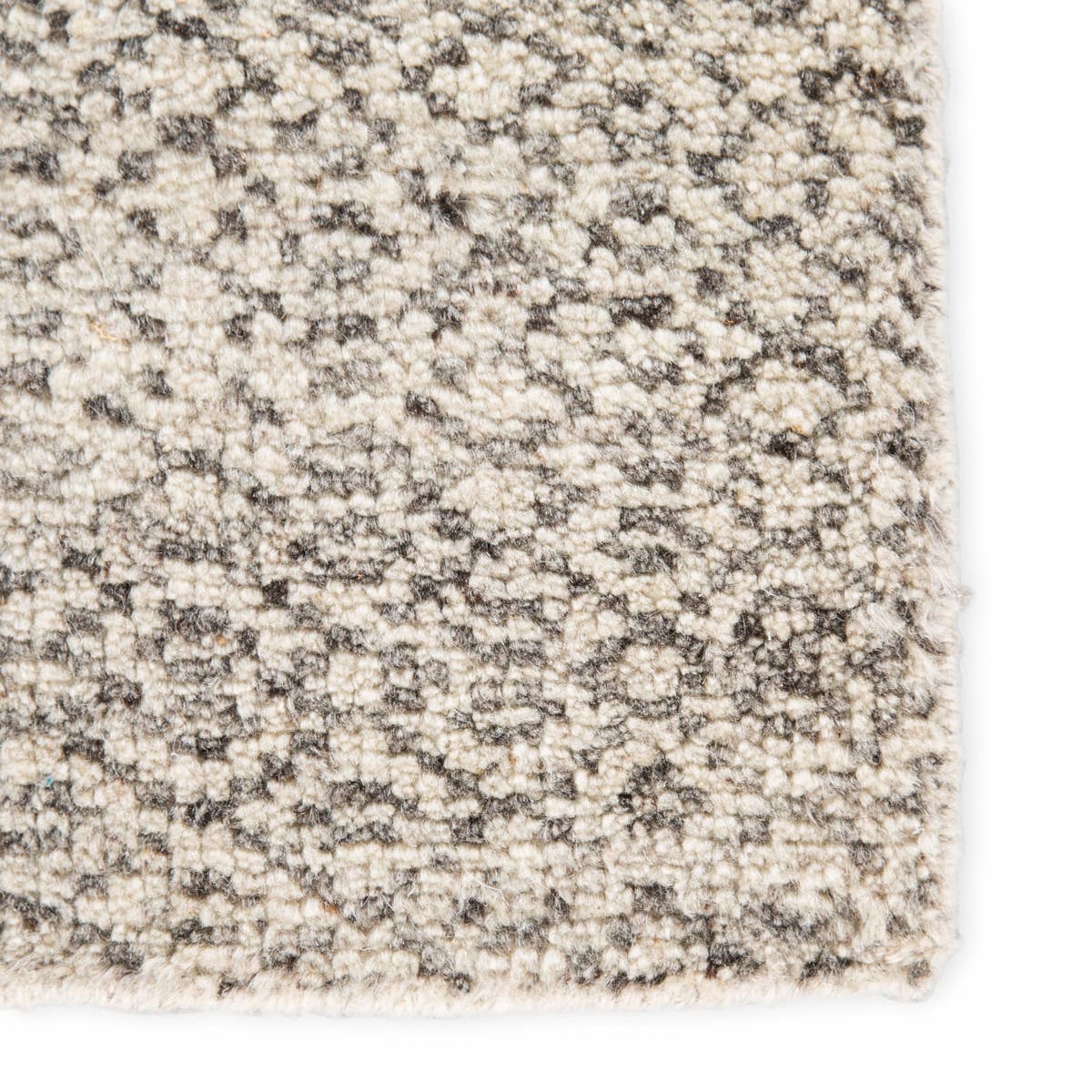 Featuring Rize Neema Hand-Knotted Rug by Jaipur Living at Amethyst Home. The Rize Neema Area Rugs offers intricate and delicately designed global patterns to the modern home. Small-scale geometric motifs create a captivating banded design on the artistically distressed Neema area rug. In a light neutral colorway of white and gray, this durable hand-knotted w.  Amethyst Home provides interior design, new home construction design consulting, vintage area rugs, and lighting in the Houston metro area.