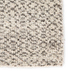 Featuring Rize Neema Hand-Knotted Rug by Jaipur Living at Amethyst Home. The Rize Neema Area Rugs offers intricate and delicately designed global patterns to the modern home. Small-scale geometric motifs create a captivating banded design on the artistically distressed Neema area rug. In a light neutral colorway of white and gray, this durable hand-knotted w.  Amethyst Home provides interior design, new home construction design consulting, vintage area rugs, and lighting in the Houston metro area.