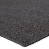 Featuring Sabine Linden Darkshadow/Ebony Rug by Jaipur Living at Amethyst Home. The Sabine collection lends rich texture and organic allure to modern homes. The Linden area rug features a fine, single-line Sumak knotting technique for an exquisite feel and craftsmanship. This rich, black natural area rug is the perfect accent for sophisticated spaces in want .  Amethyst Home provides interior design, new home construction design consulting, vintage area rugs, and lighting in the Austin metro area.