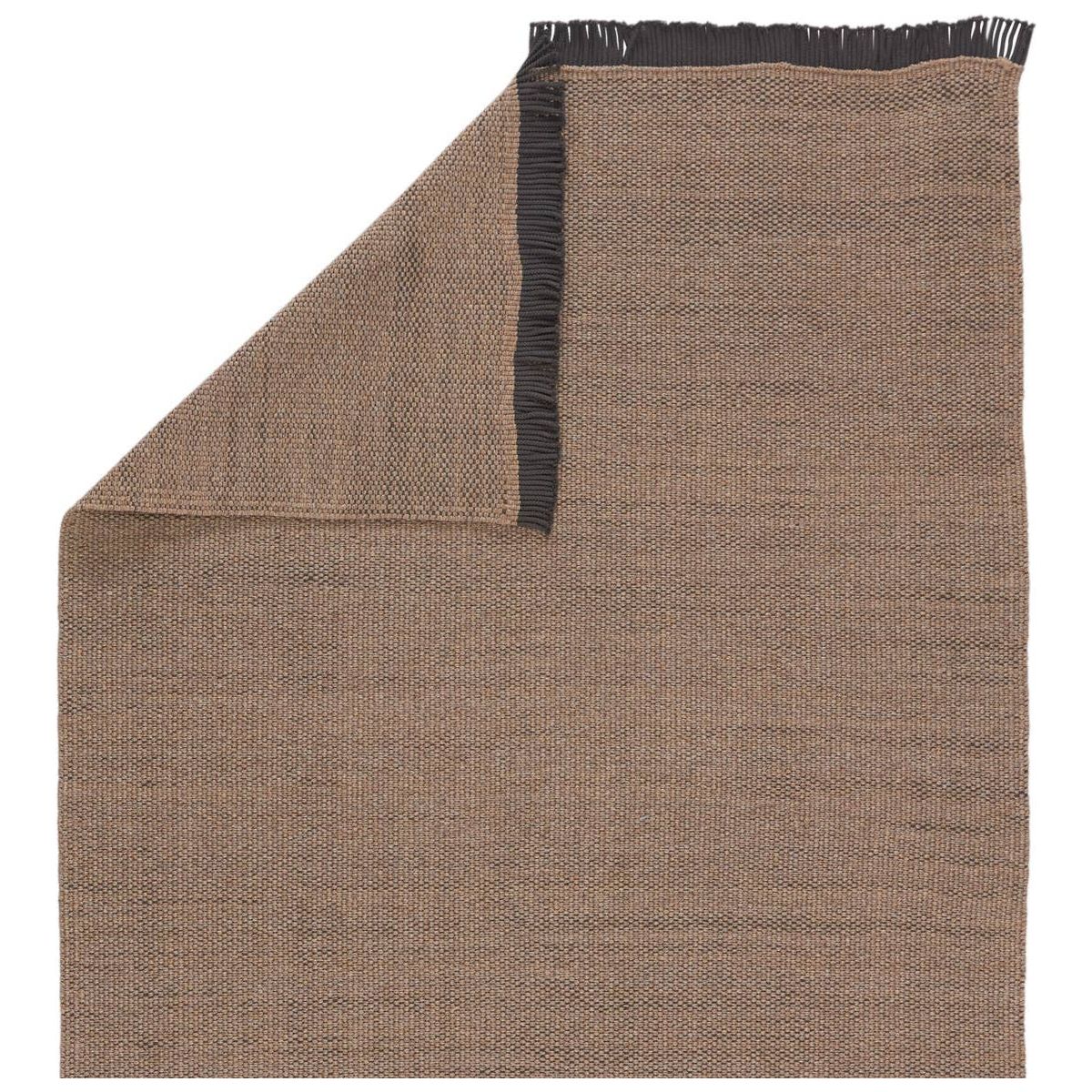 Featuring Sonder Savvy Rug by Jaipur Living at Amethyst Home. The performance-driven Sonder Savvy Area Rug offers a solid, basic design with natural-inspired texture that works for both indoor and outdoor spaces. The handwoven Savvy rug features deep, earthy tones of tan and black for the perfect neutral accent. This rug features a durable, easy-to-clean poly.  Amethyst Home provides interior design, new home construction design consulting, vintage area rugs, and lighting in the Austin metro area.