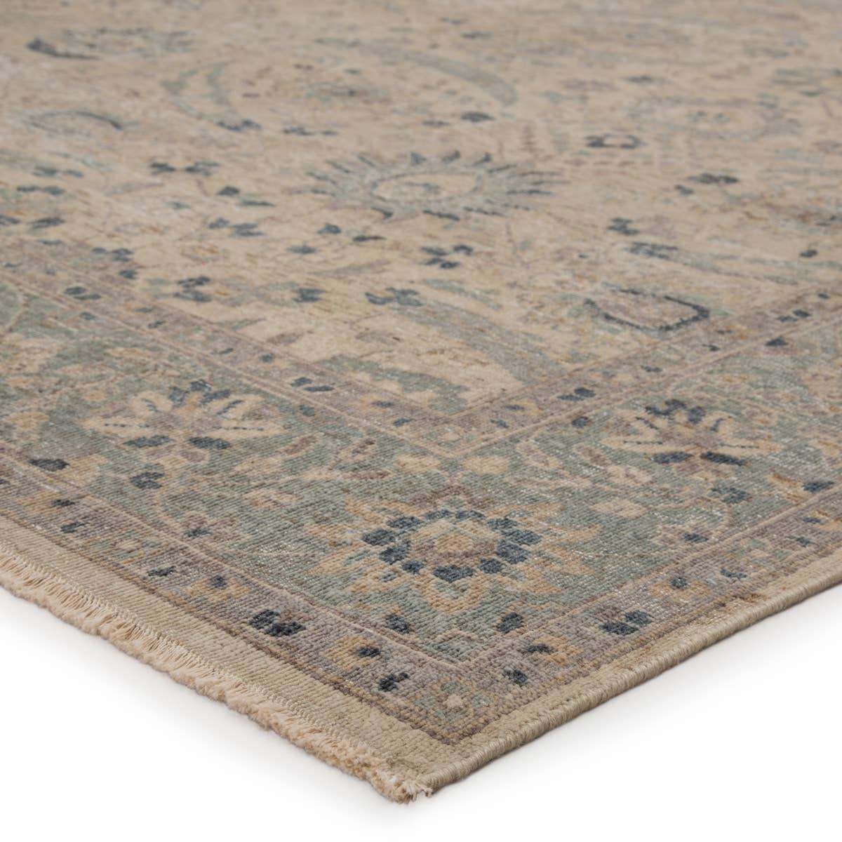 Featuring Tierzah Merey Hand-Knotted Rug by Jaipur Living at Amethyst Home. The vintage-inspired Tierzah Merey Area Rug features an antiqued wash and intricate traditional designs. The Merey wool rug boasts a Persian knot construction and tonal gray and soft beige palette that complements any style. This artisan-made rug features fringe trimmed details fo.  Amethyst Home provides interior design, new home construction design consulting, vintage area rugs, and lighting in the Des Moines metro area.