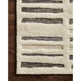 Featuring Bennett Ivory / Charcoal Hand-Knotted Rug by Loloi at Amethyst Home. Dimensional yet soft, the Bennett Ivory / Charcoal Area Rug is hand-knotted of wool, viscose and polyester in India. Featuring a new carve like high-low pile, Bennett has an ivory base with abstract tonal designs. Plus, it's plush underfoot -- a great choice for your office, bedr.  Amethyst Home provides interior design, new home construction design consulting, vintage area rugs, and lighting in the Portland metro area.