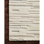 Featuring Bennett Ivory / Mist Hand-Knotted Rug by Loloi at Amethyst Home. Dimensional yet soft, the Bennett Ivory / Mist Area Rug is hand-knotted of wool, viscose and polyester in India. Featuring a new carve like high-low pile, Bennett has an ivory base with abstract tonal designs. Plus, it's plush underfoot -- a great choice for your office, bedroom, o.  Amethyst Home provides interior design, new home construction design consulting, vintage area rugs, and lighting in the Washington metro area.