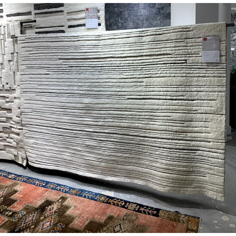 Featuring Bennett Ivory / Pebble Hand-Knotted Rug by Loloi at Amethyst Home. Dimensional yet soft, the Bennett Ivory / Pebble Area Rug is hand-knotted of wool, viscose and polyester in India. Featuring a new carve like high-low pile, Bennett has an ivory base with abstract tonal designs. Plus, it's plush underfoot-- a great choice for your office, bedroom, or.  Amethyst Home provides interior design, new home construction design consulting, vintage area rugs, and lighting in the Boston metro area.