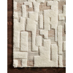 Featuring Bennett Ivory / Taupe Hand-Knotted Rug by Loloi at Amethyst Home. Dimensional yet soft, the Bennett Ivory / Taupe Area Rug is hand-knotted of wool, viscose and polyester in India. Featuring a new carve like high-low pile, Bennett has an ivory base with abstract tonal designs. Plus, it's plush underfoot-- a great choice for your office, bedroom, or .  Amethyst Home provides interior design, new home construction design consulting, vintage area rugs, and lighting in the Seattle metro area.