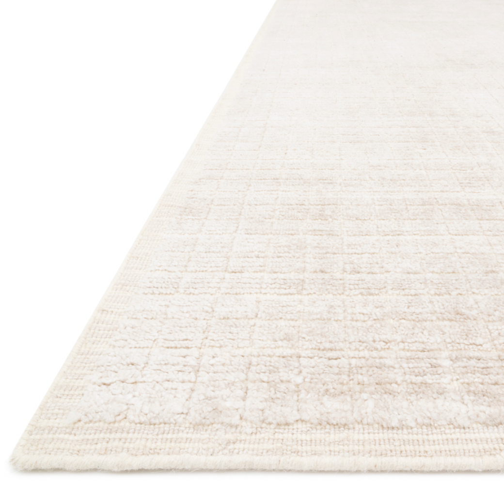 Featuring Beverly Natural Rug by Loloi at Amethyst Home. Modern and refined, the Beverly Natural rug by Loloi is hand-loomed by master artisans of viscose and wool pile. Clean lines and minimalist hues allow you to layer Beverly into any room.
Hand Loomed68% Viscose | 32% WoolBEV-01 Natural
Clean spills, including water, immediately by blotting with a.  Amethyst Home provides interior design, new home construction design consulting, vintage area rugs, and lighting in the Salt Lake City metro area.