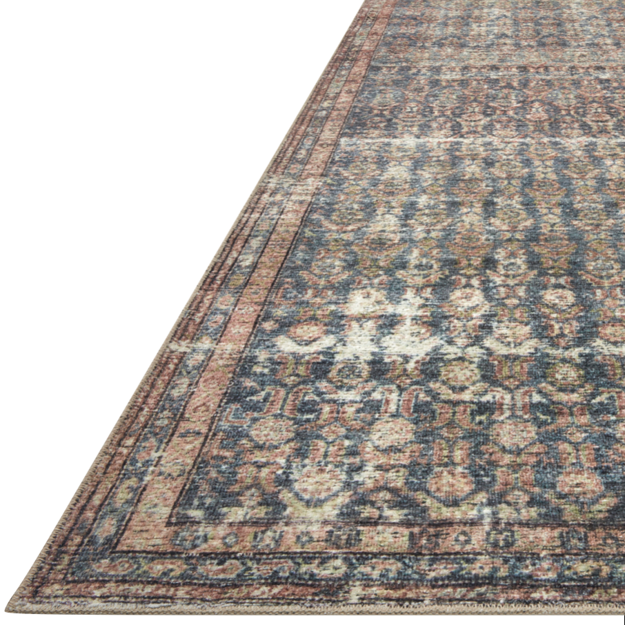 Featuring Billie Amber Lewis x Loloi Ocean / Brick Rug by Loloi at Amethyst Home. Touting richly saturated colors and a distressed pattern, the Billie Collection captures the look of a well-worn antique rug at a remarkable value. Reminiscent of one-of-a-kind rugs, this Amber Lewis x Loloi collection features random variations in color that render no two pi.  Amethyst Home provides interior design, new home construction design consulting, vintage area rugs, and lighting in the Charlotte metro area.