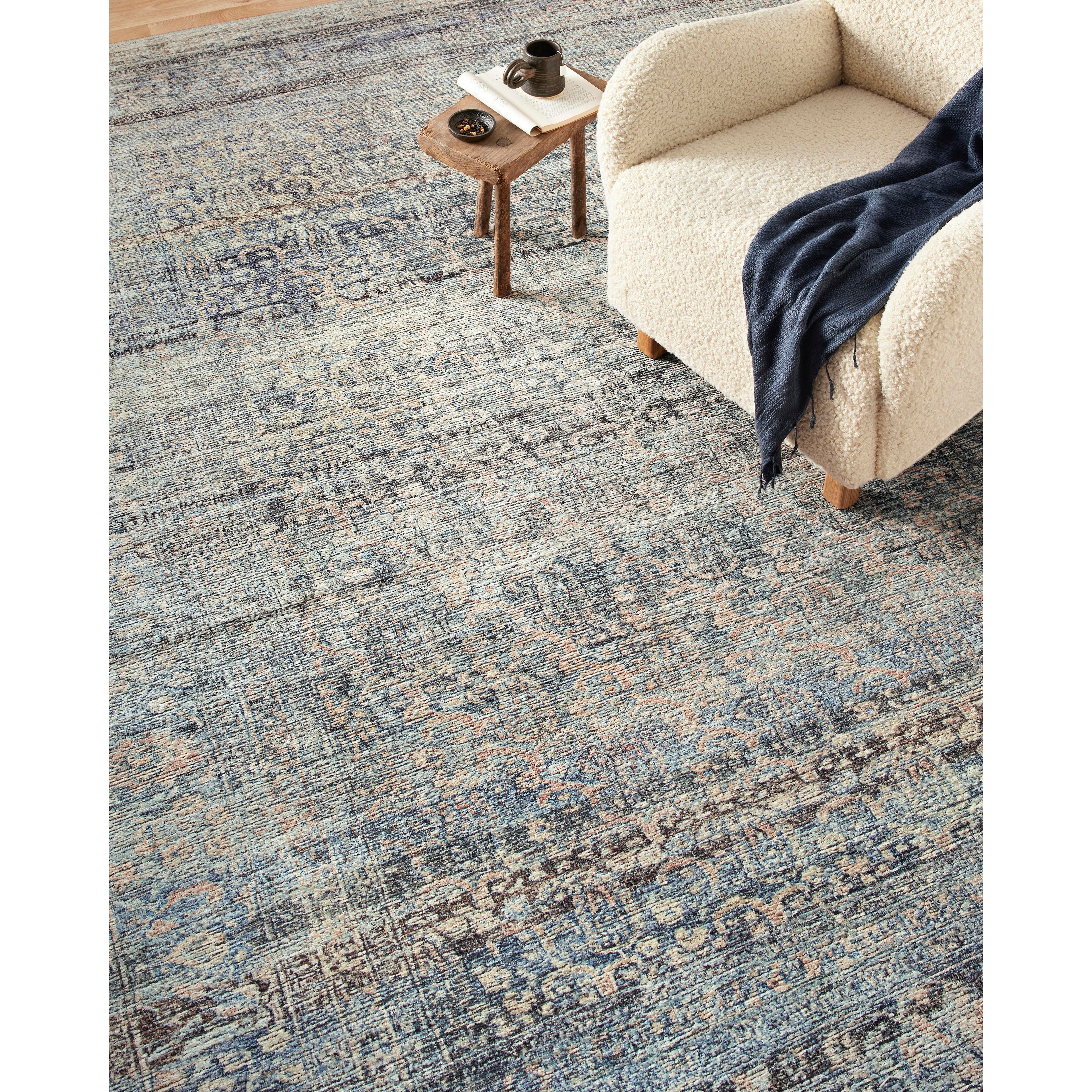 Featuring Billie Amber Lewis x Loloi Denim / Blush Rug by Loloi at Amethyst Home. Touting richly saturated colors and a distressed pattern, the Billie Collection captures the look of a well-worn antique rug at a remarkable value. Reminiscent of one-of-a-kind rugs, this Amber Lewis x Loloi collection features random variations in color that render no two pieces.  Amethyst Home provides interior design, new home construction design consulting, vintage area rugs, and lighting in the Omaha metro area.