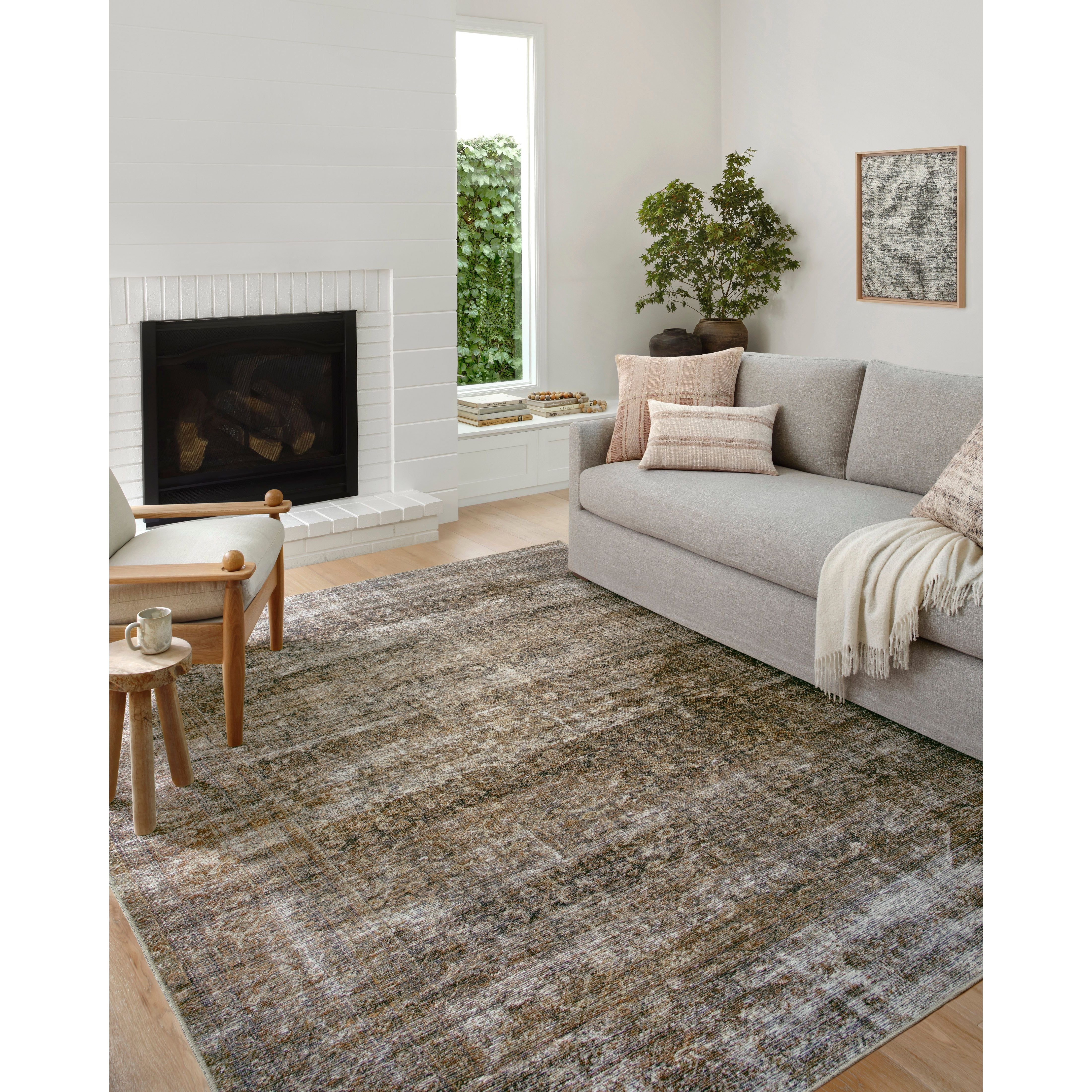 Featuring Billie Amber Lewis x Loloi Tobacco Rust Rug by Loloi at Amethyst Home. Touting richly saturated colors and a distressed pattern, the Billie Collection captures the look of a well-worn antique rug at a remarkable value. Reminiscent of one-of-a-kind rugs, this Amber Lewis x Loloi collection features random variations in color that render no two pi.  Amethyst Home provides interior design, new home construction design consulting, vintage area rugs, and lighting in the Washington metro area.