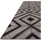 Featuring Dorado Beige/Espresso Rug by Loloi at Amethyst Home. The Dorado Beige/Espresso rug from India features an intriguing combination of hand stitched authentic cowhide and hand woven viscose for a look that's at once bold and unexpected. Available in four sizes including a runner.
Hand-StitchedFront: Textile Part: 62% Rayon | 34% Wool | 4% Other FibersNo.  Amethyst Home provides interior design, new home construction design consulting, vintage area rugs, and lighting in the Miami metro area.