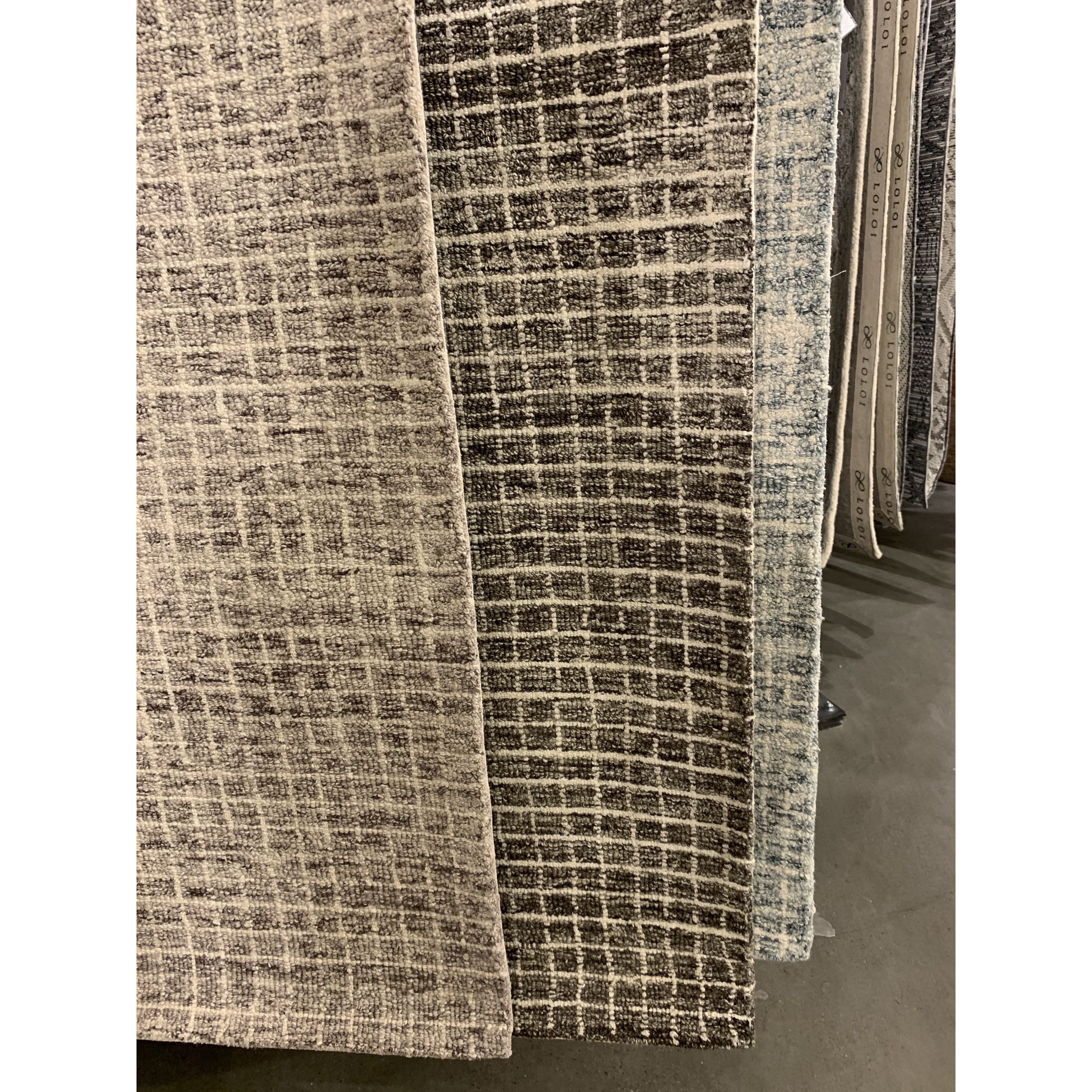 Featuring Giana Smoke Rug by Loloi at Amethyst Home. Inspired by textural watercolors, the Giana Smoke Area Rug combines a relaxed grid with soft variations of smokey creams for an effortless and sophisticated look. Each area rug is hooked of 100% wool by artisans for a beautiful textural layer to your home. The soft textures of this area rug bring warmth an.  Amethyst Home provides interior design, new home construction design consulting, vintage area rugs, and lighting in the Houston metro area.